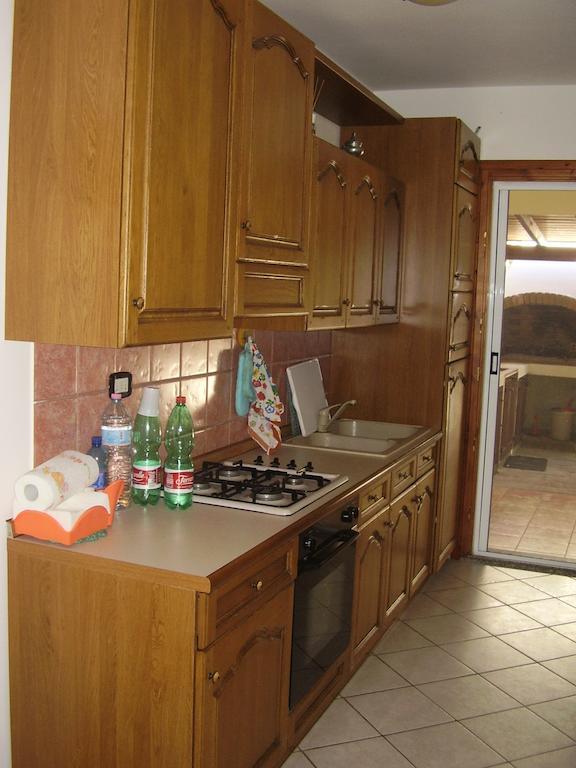 Casa Giovanna Porto Pino Værelse billede