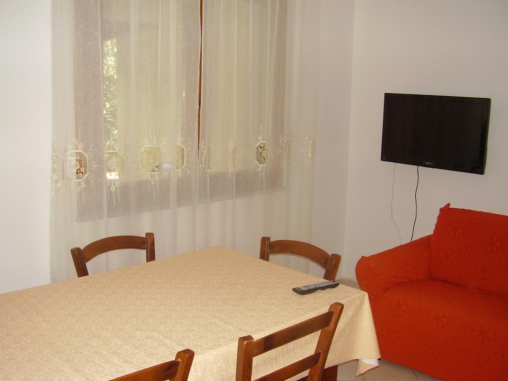 Casa Giovanna Porto Pino Værelse billede